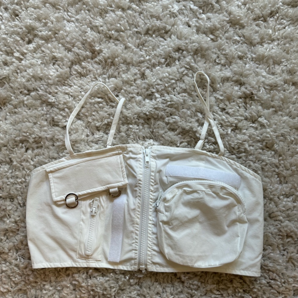 White bra with velcro and zipper details. Size m